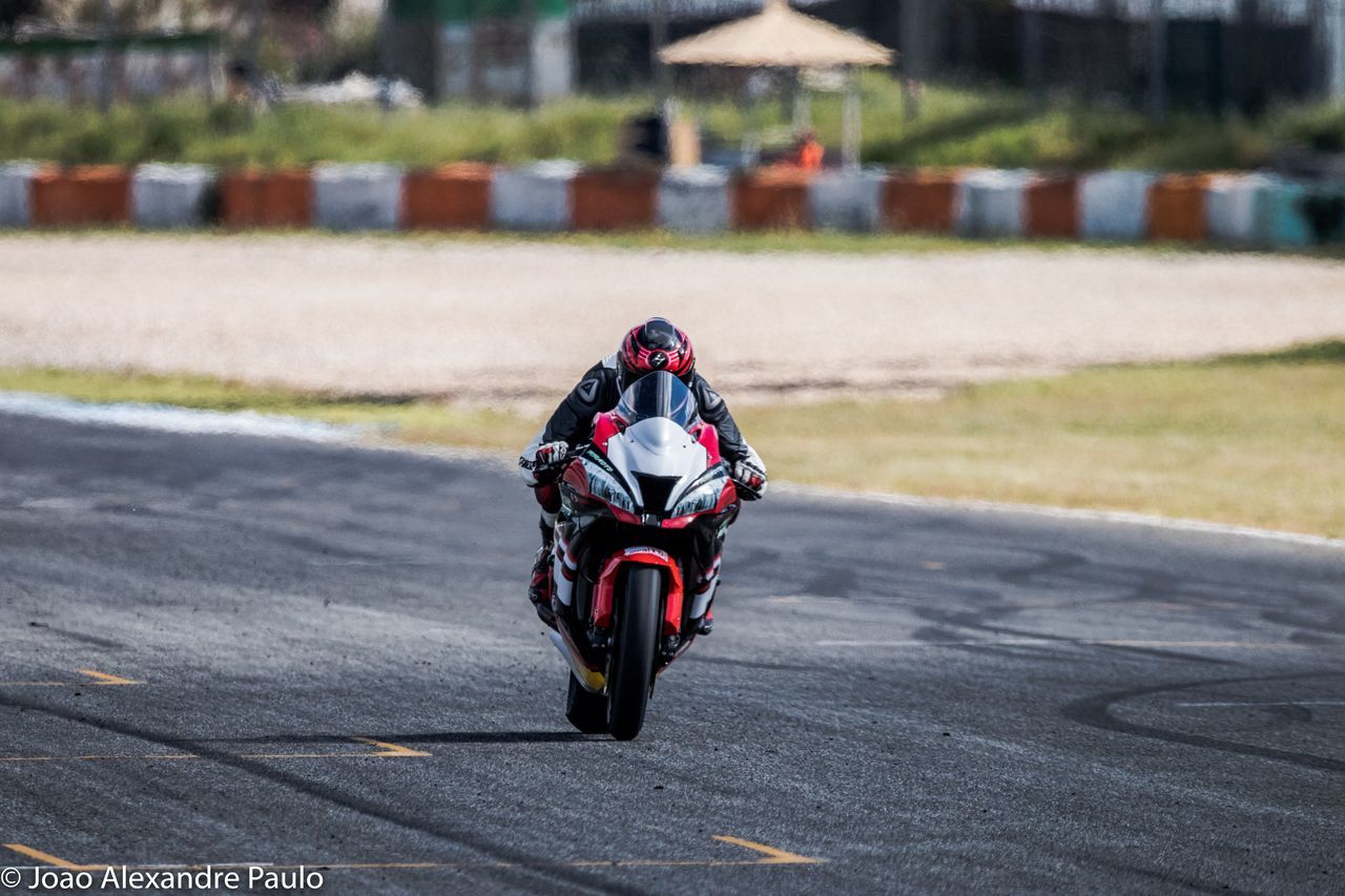 competition, outdoors, day, sport, sports race, close-up, motorcycle racing, motorsport, no people