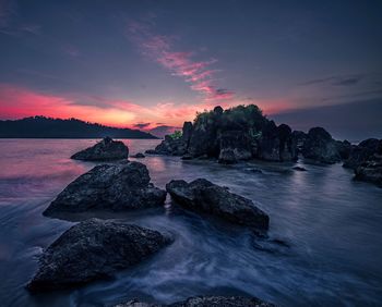 Scenic view of sea against sky during sunset