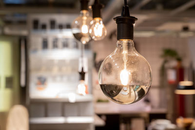 Close-up of illuminated light bulb