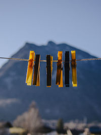 Clothes drying on clothesline against sky