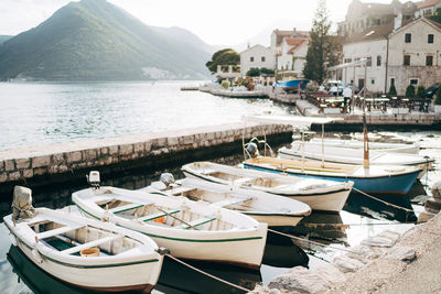 Boats moored at harbor