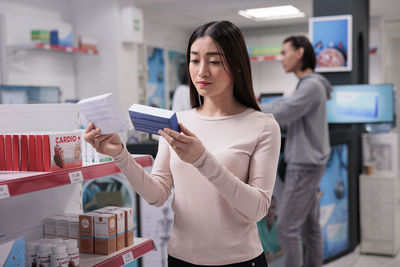 Young woman using mobile phone