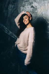 Portrait of a smiling young woman in winter