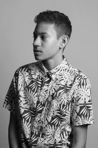 Young man against white background