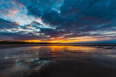 Scenic view of dramatic sky over sea