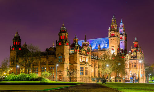 Illuminated buildings in city at night