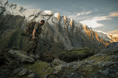 View of hunter in mountains