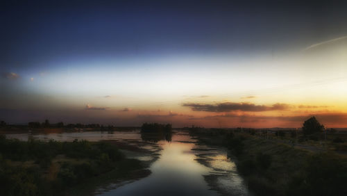 Scenic view of sea at sunset