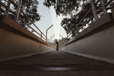 Surface level of empty road along buildings