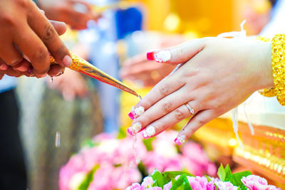 Close-up of hand during wedding ceremony