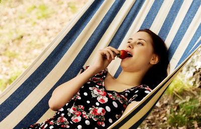 Portrait of woman eating food