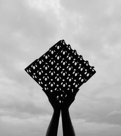 Low angle view of metal structure against sky