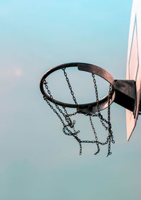 Low angle view of basketball hoop against sky