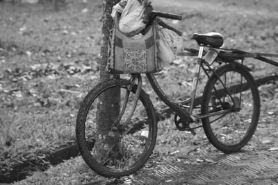 Bicycle parked on field