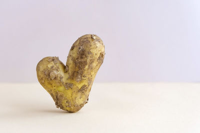 Close-up of heart shape on white background