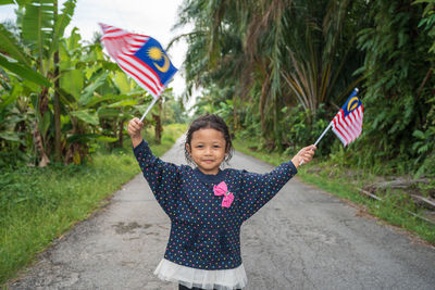 Portrait of a girl holding umbrella