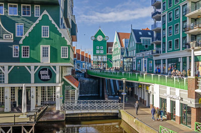 Canal lined with post-modern architecture inspired by traditional zaan architecture
