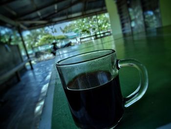 Close-up of coffee cup on table