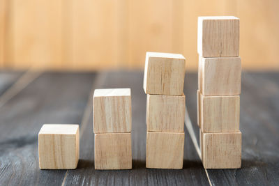 Close-up of stacked wooden blocks on table
