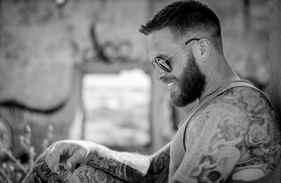 Close-up of young man with tattoo