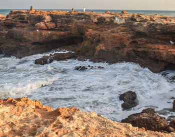 Scenic view of rocky beach