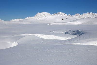 Winter scene at the snowy ski resort of alpe d'huez in isere in france