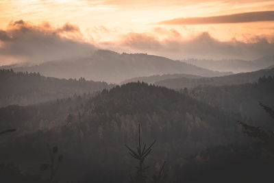 Scenic view of mountains against sky during sunset