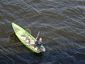 High angle view of man surfing in sea