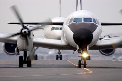 Japanese turboprop airliner taxing to runway