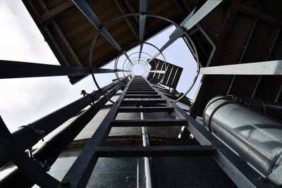 Low angle view of staircase against sky