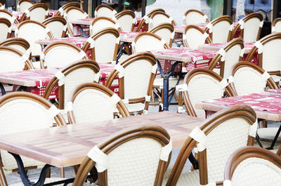 Empty chairs and table in cafe