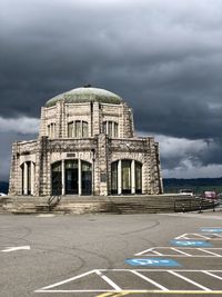 View of building against cloudy sky