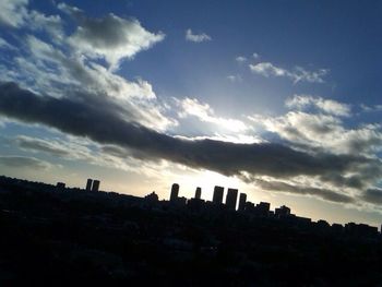 Building against cloudy sky