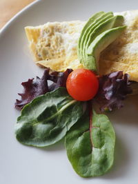 High angle view of fresh vegetables in plate