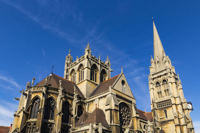 Low angle view of cathedral against blue sky