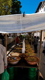 People in restaurant at market stall