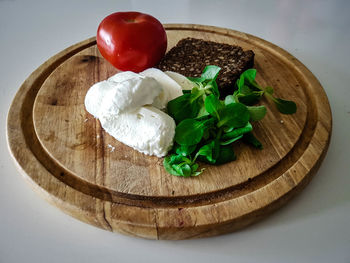 High angle view of vegetables in plate on table