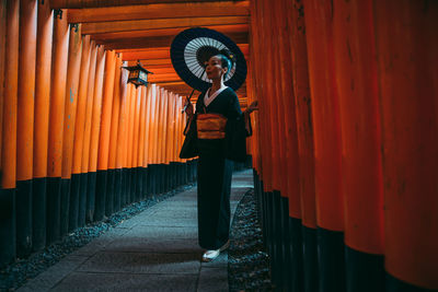 Full length of man standing in temple