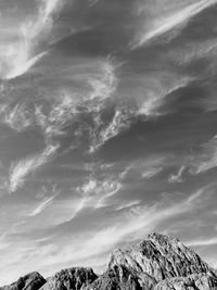 Low angle view of rock formation against sky