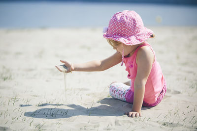 Full length of girl on beach