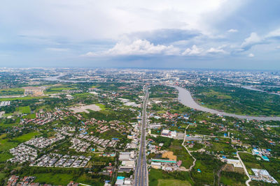 High angle view of buildings in city against sky