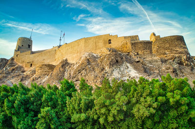 Low angle view of fort against sky