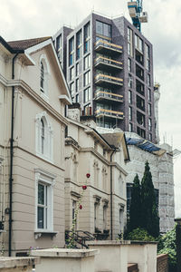 Low angle view of residential building against sky