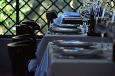 Empty chairs and tables in restaurant