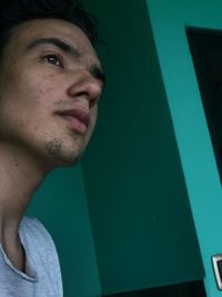Close-up portrait of young man standing outdoors