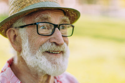 Close-up portrait of man wearing eyeglasses
