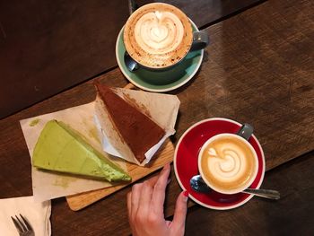 High angle view of coffee cup on table