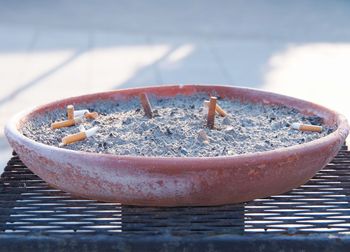 Close-up of cigarette on table