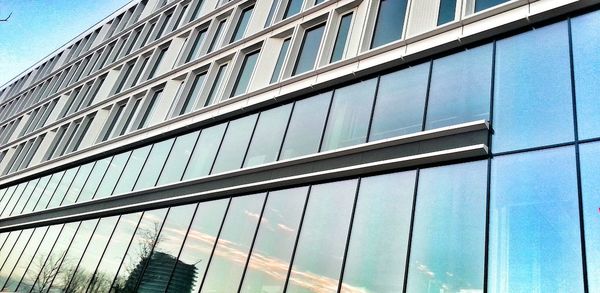 Low angle view of modern building against sky