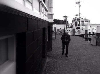 Full length of woman standing in city